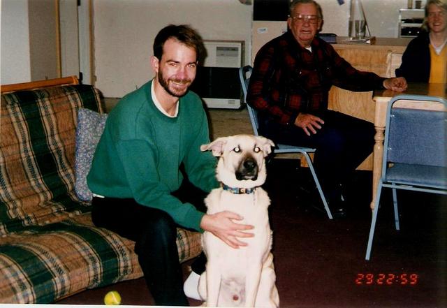 Bob and Kenai on Moose Mountain.  Grandpa Bolton in the background.
